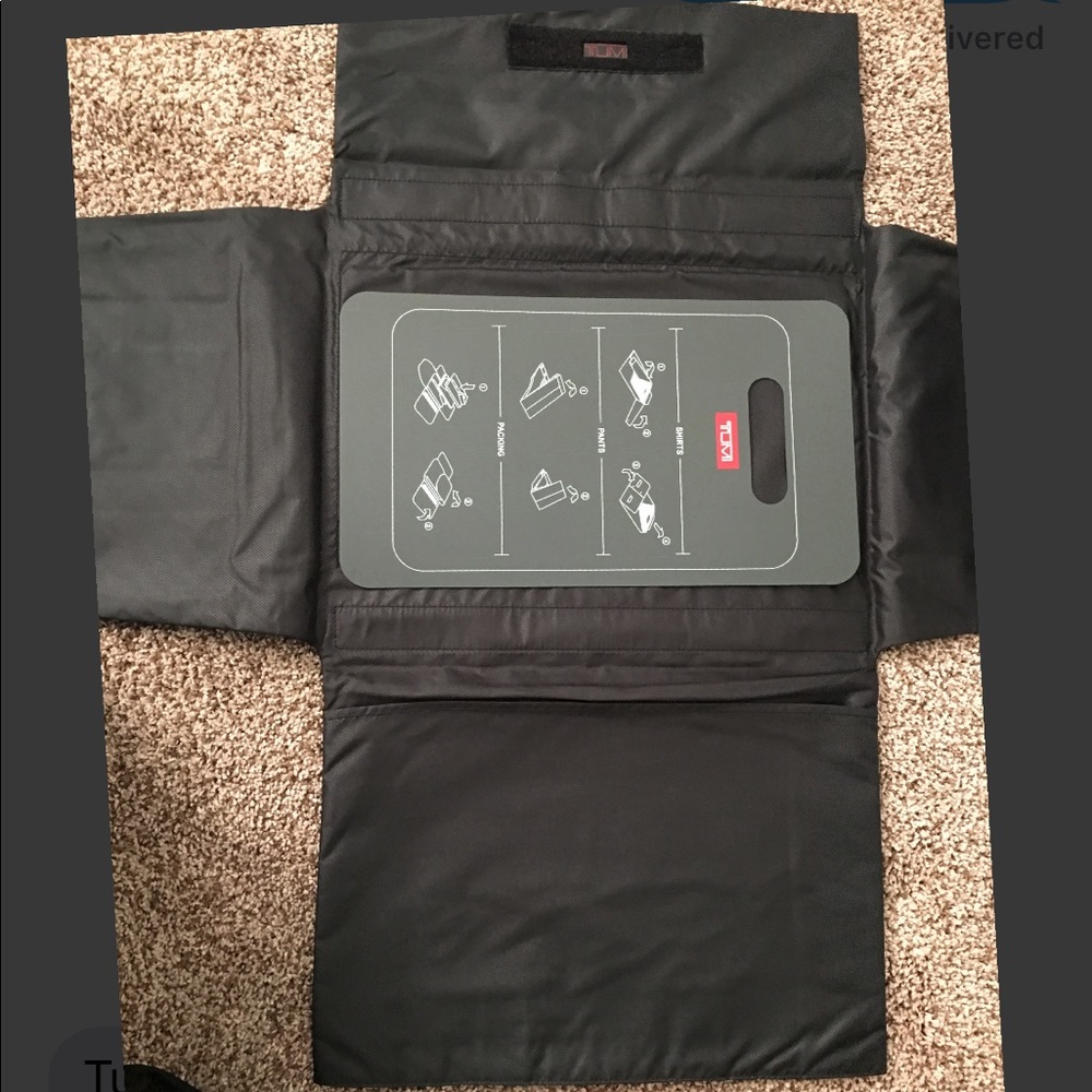 Tumi folding board case.
